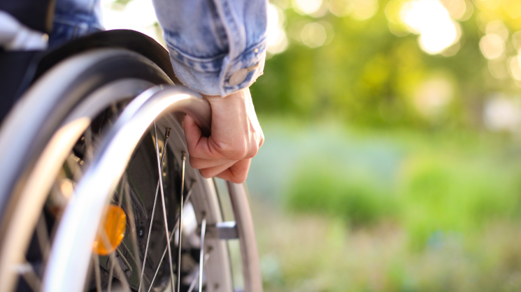 close-up of a person in a wheelchair